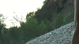 Busty brunette ass fucked by the river