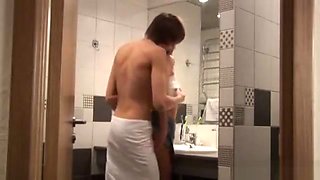 Slim teenager enjoys sex in a bathroom