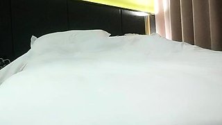 Cute amateur asian web cam girl playing with her toy