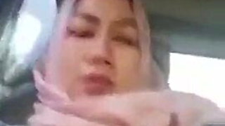 Jilbab (Hijab Tudung) MILF in the Car