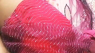 Beautiful Indian Bhabhi in Red Colour Saree.