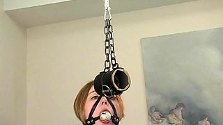 Young brunette in stockings trained in extreme bondage