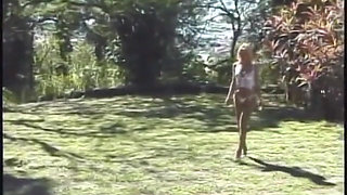 Sexy blonde shemale gets doggystyled outdoors