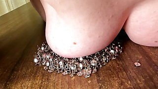 Putting breasts in thumbtacks