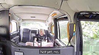 Blonde rubs clit and bangs in fake taxi