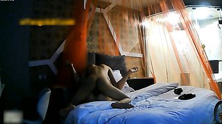 Cute amateur asian web cam girl playing with her toy