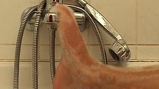 Big Boobed German Slut Enjoys Solo Action in the Shower