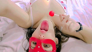 Hot and naughty student sucking lollipops at the bed wearing her new white lingerie and touching herself