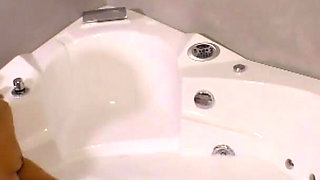 Big ass blonde sprayed in her mouth in the bathroom