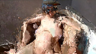 Pregnant sunbathing on balcony