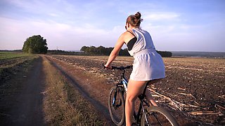 Cycling Outdoors and Flashing Ass in Miniskirt