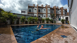 watch us playing in our swimming pool