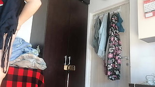 Amateur Wife Dancing Naked at Home. Amateur Woman Has Fun Trying on Clothes and Cutting Them.