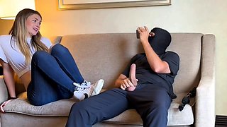 Foot mistress edging masked slave's cock in femdom session