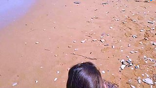 Sex on the nude beach with a naked whore in doggystyle -