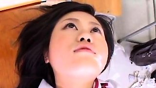 Horny Japanese teen in school uniform sucks cock