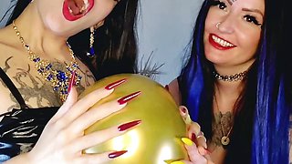 Fetish of inflatable balloons. Fetish of long sharp nails from two Dominatrixes.