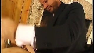 Tied up woman with clitoris piercings, sodomized by a stick