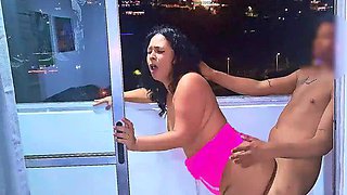 Latina whore fucking and sucking penis on a balcony overlooking the public street in Medellin, a wet blowjob and a frenetic fuck. While she is being fucked the cars pass by on the road. Venezuelan slut