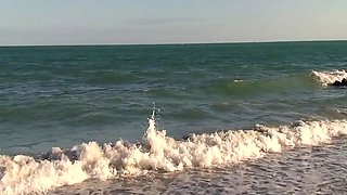 Ashlyn Lee goes fishing, but she would rather enjoy a masturbation session on the sand. She gets caught on-camera by our voyeur videographer.