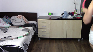 Sexy wife trains naked at home. Sexy brunette tries on stockings, hairy pussy, big ass, big tits.