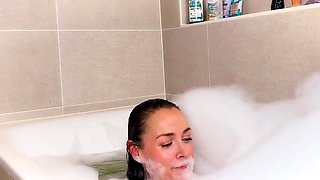 Teen Sexy Lexxy having dildo sex in the bathtub