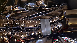 Slave slut-orgasma Celeste bound in black latex and leather pushed to a orgasm
