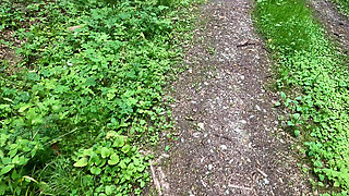 Slapping Her Naked Vagina in the Woods