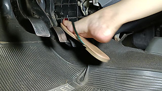 Accelerating and Pumping Racing Pedals Wearing Flip Flops
