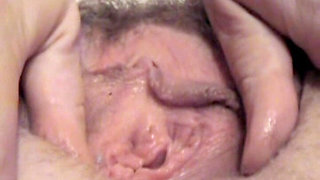 Hot Mature Housewife Rubs Here Fantastic Hairy Pussy in Close up and Beocomes a Huge Cumshot on Face and Mouth