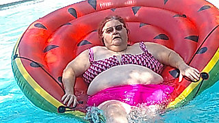 Short Video of BBW Nurse Vicki Floating on Her Huge Watermelon