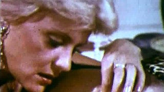 Two busty tattooed blonde lezzies finger and lick in bed