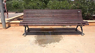 Short hair blonde babe enjoys pissing outdoors