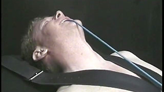 Bound man is subdued with strange penis remedy by two chicks in dungeon