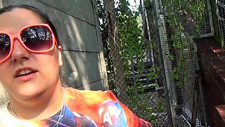 Short and thick brunette outdoor pising and public flashing