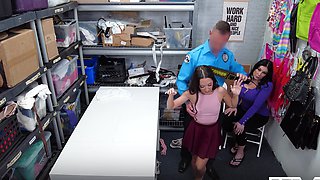 Three girls are having fun with a guy in an office setting