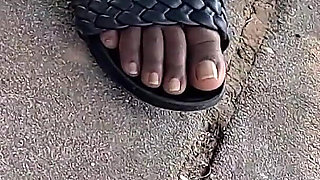 Hot Fudge Tasty Feet Left Foot Wrapped at the Bus Stop