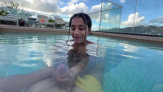 She sucks my dick a little bit and jerks me off in the pool