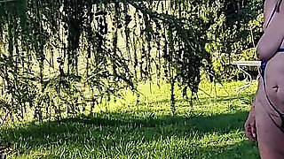 Watch 77 Years Old Martina Alsmost Naked in Her Garden