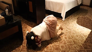 A Cute Little Dressed in a Jk Uniform Was Walking Around Barefoot on the Ground.