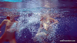 Blonde and Brunette babes swim naked