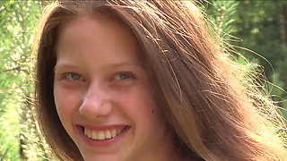 Young Nicole caresses herself solo in the forest
