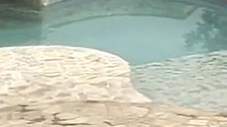 Skinny brunette with small tits loves to fuck by the pool