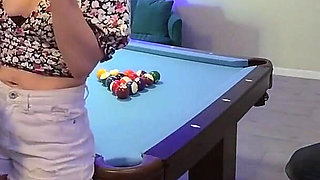 Foursome Shenanigans on a Pool Table