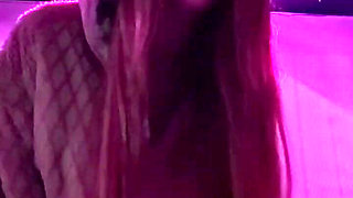 Smoking a Cigarette Outdoor While Wearing Only a Bikini and a Jacket