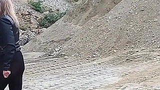 Grandma Is Walking Around a Gravel Pit in Tight Leggings and High Heels!