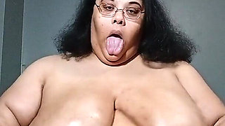 Rubbing Oil All Over My Tits and Belly