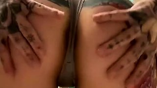 Inked camgirl trying on panties and flashing her tight pussy