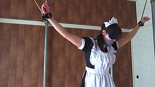 A Restrained Maid Writhing in Pleasure From a Remote-controlled Vibrator