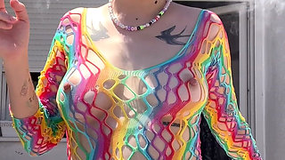 Smoking in a Rainbow Fishnet on the Balcony